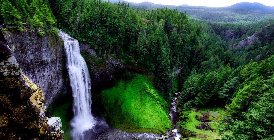 beautiful natural waterfall in beech - water  flow.