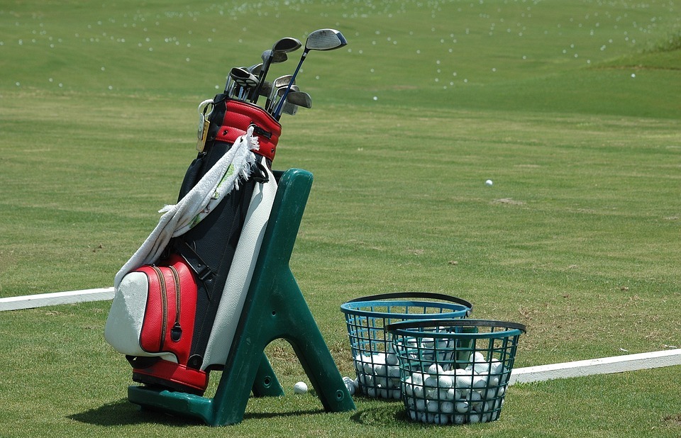 golf bag, clubs, ball