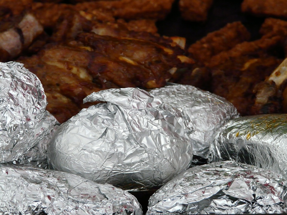 baked potatoes, potato dish, aluminum foil