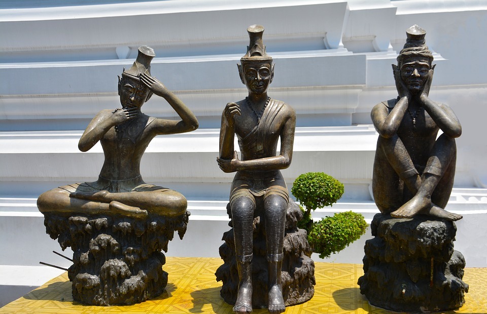 thai yoga statues, spiritual practice, sculpture poses for massage