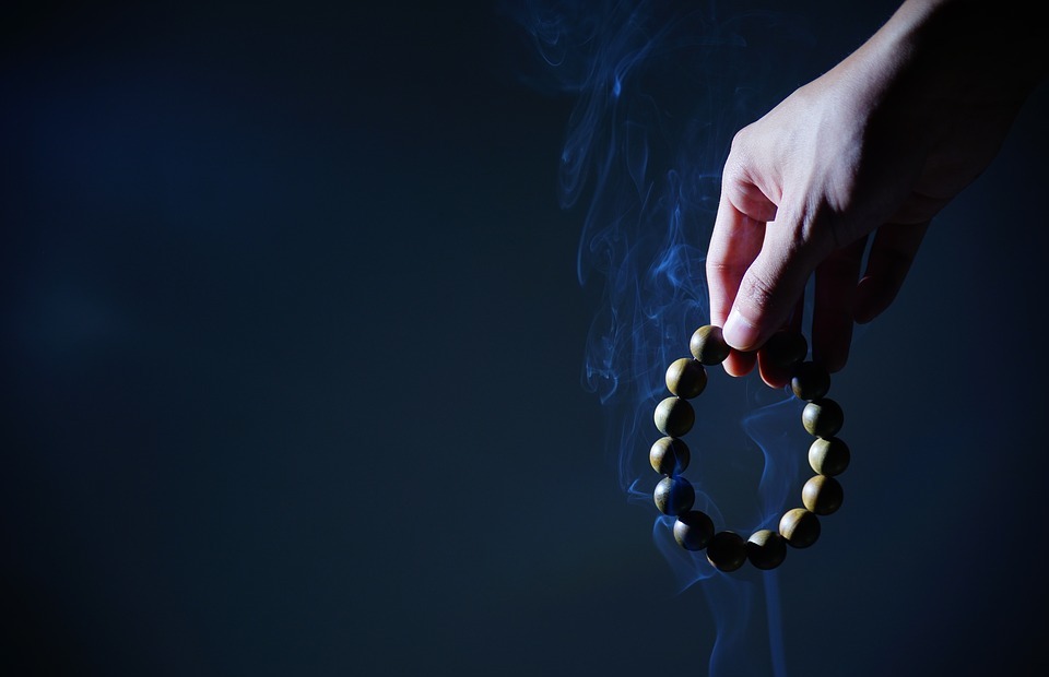 hand, buddhist prayer beads, smoke