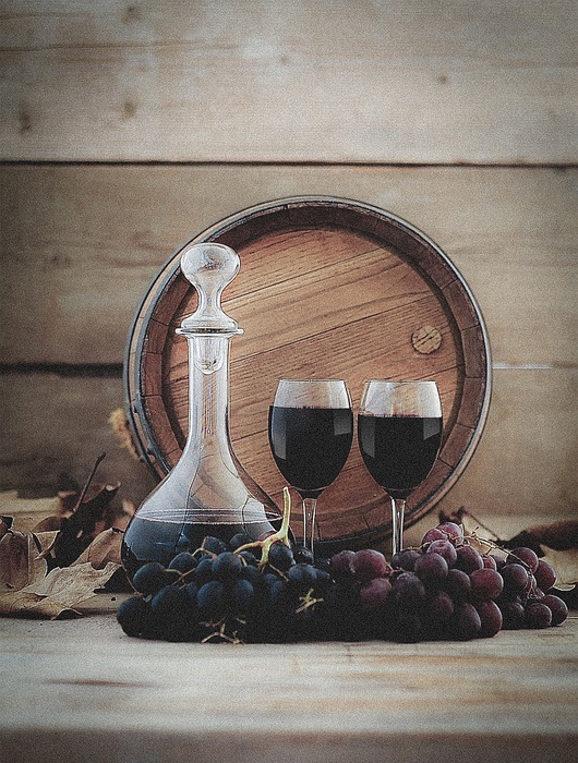 wine carafe, glasses, grapes
