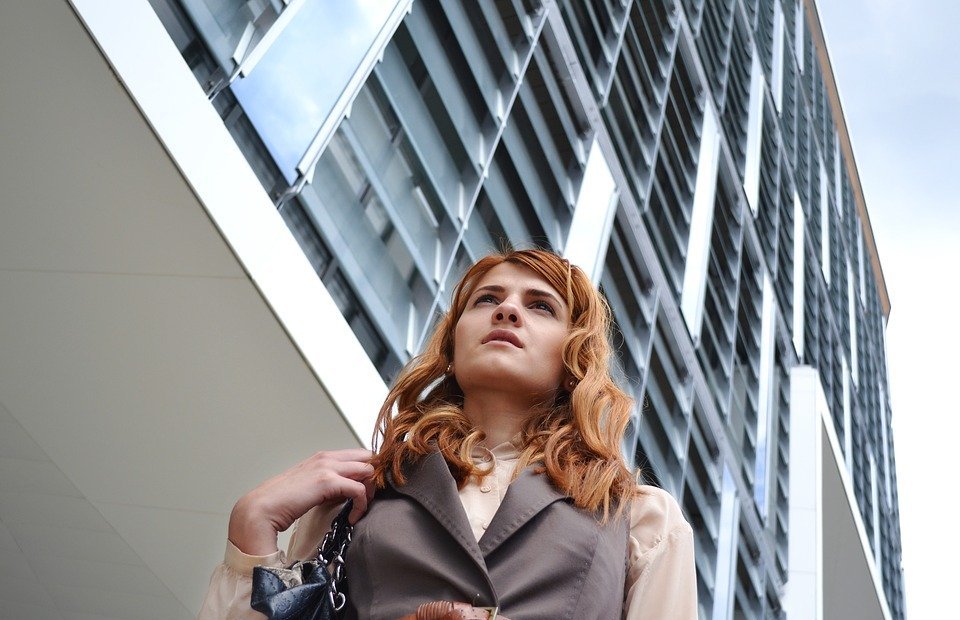 business woman portrait, outdoors business center, business