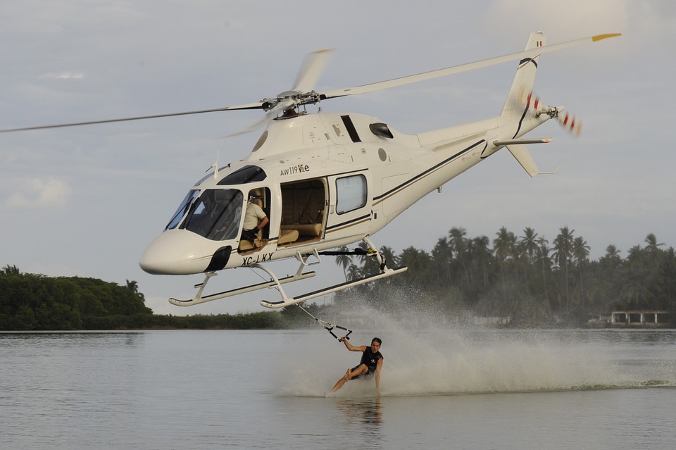 water skiing, helicopter, extreme