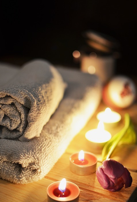 massage therapy, candles, towels