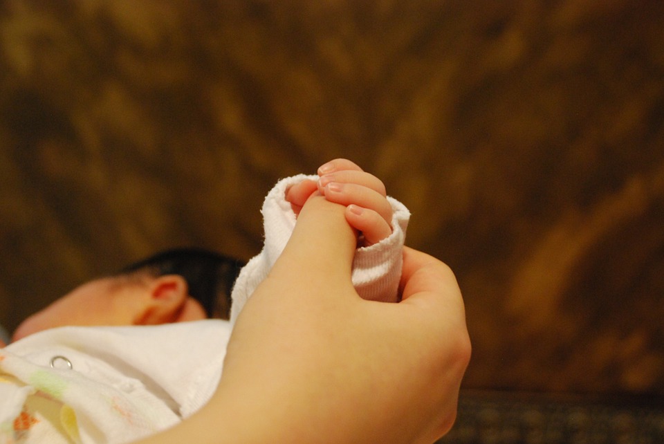 baby hands, with mom, mom and baby