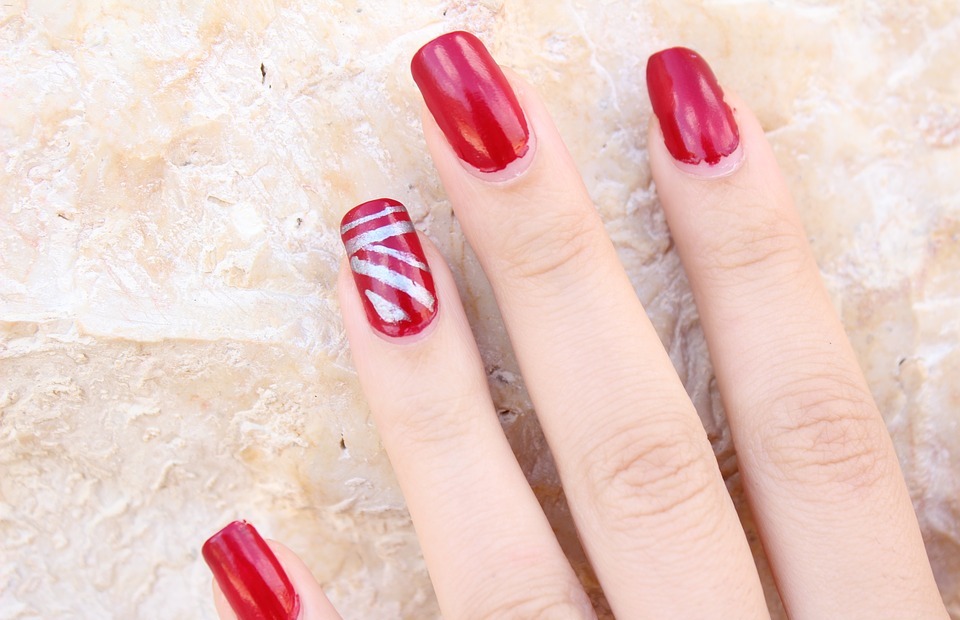 finger, nail polish, red